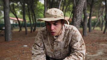 Soldier Tired Of Running He Remarries Behind The Trunk Of A Tree In The Forest video
