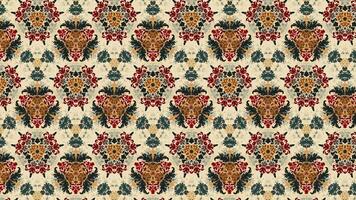 Let the vibrant colors and intricate details of a seamlessly looping flower pattern kaleidoscope mandala abstract background captivate your senses in 4k resolution. video