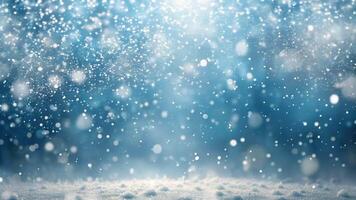 Light snow falls from top to bottom on an abstract blue background video