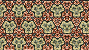 Let the soothing rhythm of a seamlessly looping abstract background of flower pattern kaleidoscope mandala in 4k transport you to a world of tranquility. video