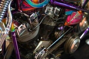 Closeup and crop perspective view twins engine of old engine classic of 1970's Chopper and cruise motorbike in a custom design. photo