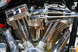 Closeup and crop engine of Chopper motorbike and air intake in arrow design with chrome colors photo