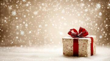 Winter gift box with red ribbon on snowy surface surrounded by sparkling lights creating a festive atmosphere photo