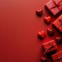 Valentine's day gifts and decorations arranged creatively on a vibrant red background with heart-shaped items photo