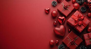Festive red presents and hearts arranged on a vibrant red background for a joyful celebration or special photo