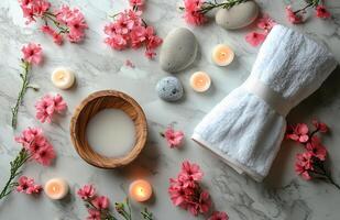 Relaxing spa setting with natural elements showcasing calm ambiance, soft towels, flowers, stones, and soothing photo