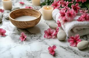 Relaxing spa setting with natural elements showcasing calm ambiance, soft towels, flowers, stones, and soothing photo