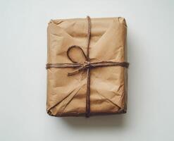 Wrapped gift box with twine ribbon showcasing a simple and elegant presentation for special occasions photo