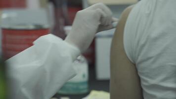 Injecting Vaccination Around Shoulder with Syringe video