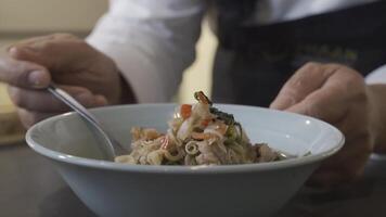 Close up to boiled and fried Pork Thai Menu with Shrimp Paste in white bowl that ready to serve and eat. video
