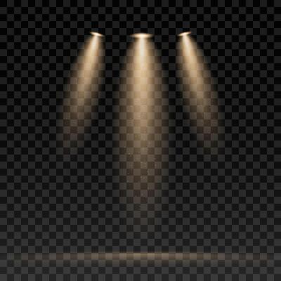 Bright lighting spotlights with warm light and sparkle. An isolated light effect for concerts, scene illumination, the circus, theatres, parties and shows. An abstract festive design element.