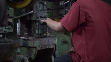 Machine and tool of Computer numerical control CNC, factory creates metal religion art such as Gold rolling machine and little jewelry in religious ceremony. video