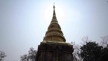 Wat Phra That Chom Kitti is its crooked chedi, contains a fragment of the Buddha relic that was split divided amongst this site, Chiang Rai, Thailand. video
