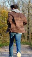 Man runing autumn forest video