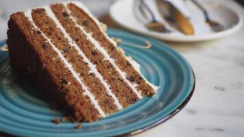 A decadent slice of chocolate layer cake presented beautifully on a plate video