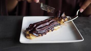 A CloseUp View of an Indulgent Chocolate Dessert with a Fork Ready to Enjoy video