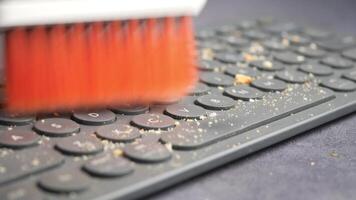 Cleaning Your Keyboard with a Brush An Effective Method for Dust Removal video
