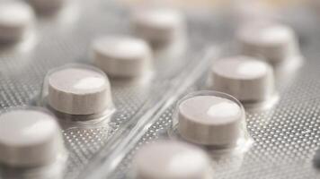 Close up of pills of blister pack on table video