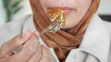 Savoring a Delicious Bite of Food with a Fork, Enjoying Every Flavorful Moment video