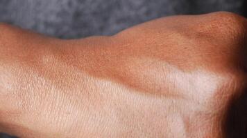 Closeup of a human hand showing its veins and unique texture video