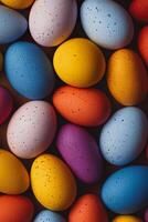 Colorful array of Easter eggs spread across a surface for holiday celebration photo