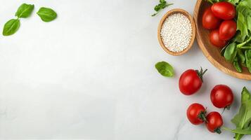 Fresh green vegetables on a light marble surface ready for salad preparation photo