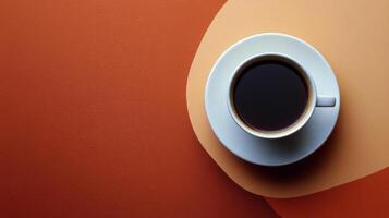 Coffee cup with rich foam on a warm brown background creating a cozy atmosphere photo