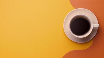 Enjoying a warm cup of coffee on a vibrant orange background photo