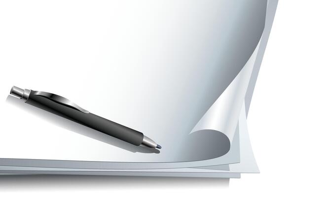 Elegant Black Pen on Stack of Blank Papers