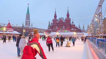 People are skating on a skating rink in the center of Moscow. Gum skating rink video