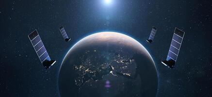 Satellites in orbit of planet Earth with the lights of the night cities of Europe. satellite internet connection. photo