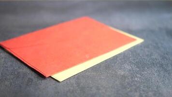 slow motion of colorful envelope dropping on black background video