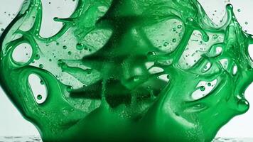 3d icon Green paint splashing and forming a christmas tree shape with transparent background video