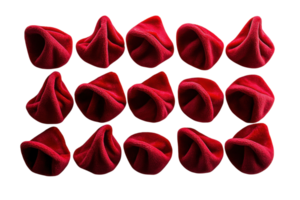 Unique arrangement of red fabric pieces resembling soft cones on a white background in creative textile art png
