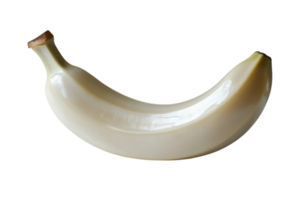 Unique white banana resting on a flat surface, showcasing its unusual color and smooth texture under bright light png