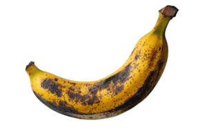 Ripe banana with brown spots resting on a clean white background showing natural aging process png