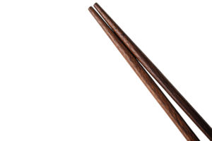 Chopsticks made of dark wood placed against a white background for a minimalist presentation png