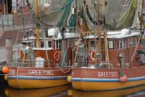 ships in the harbor of greetsiel photo