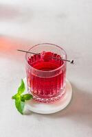 Gin with raspberry tonic photo