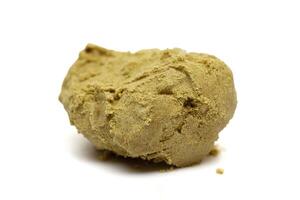 Hashish isolated on white background photo