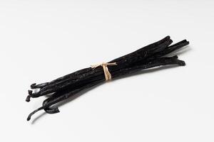 Vanilla beans on white background photo
