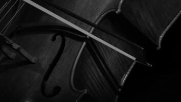 A closeup of a violin and bow, ready to play. photo