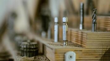 Various tools. file, screwdriver, hammer, pliers, garden tools are displayed on wooden shelf inside rustic garage or manufactory, workshop studio in a rustic garden house. Hobby, leasure activity. High quality photo