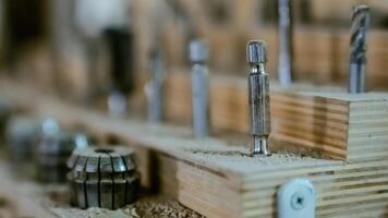 Various tools. file, screwdriver, hammer, pliers, garden tools are displayed on wooden shelf inside rustic garage or manufactory, workshop studio in a rustic garden house. Hobby, leasure activity. High quality photo