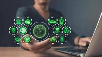 person use software to save energy,and reduce global warming,climate change,ecology friendly investment,ESG environment social governance,Green Business Innovation and Sustainable Development concept. photo