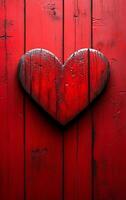 A red heart carved into a wooden surface. The heart is surrounded by wood grain, giving it a rustic and natural feel. The red color of the heart and the wood grain create a warm photo
