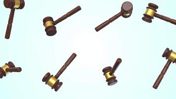 Gavels Falling on a Light Blue Background. Mallet of the Judge Wooden Hammer 4K video