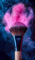A makeup brush is covered in pink powder, creating a dramatic and artistic effect. The brush is the main focus of the image, and the pink powder adds a sense of color and vibrancy to the scene photo