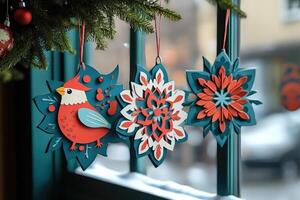 Christmas ornaments hanging from a christmas tree branch in a shop window display photo
