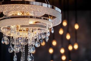 Crystal chandelier shining brightly in elegant room, lighting design photo
